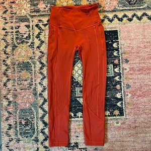 Lululemon 7/8 leggings. High waisted size 4 in a brick red.